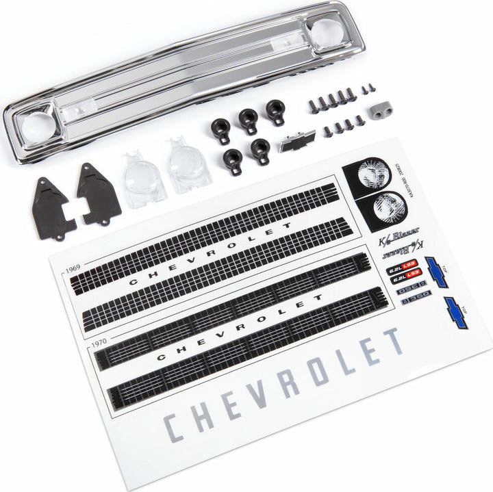 Grille, Chevrolet Blazer (1969 - 1970)/ Grille Retainers (5)/ Headlight Housing (2)/ Headlight Lens (2)/ Turn Signal Lens (2)/ Hood Emblem/ Hood Emblem Mount/ 2.6x8 BCS (5)/ 2.5x6 BCS (4)/ 1.6x5 BCS (self-tapping) (2) (fits #9112 Body)