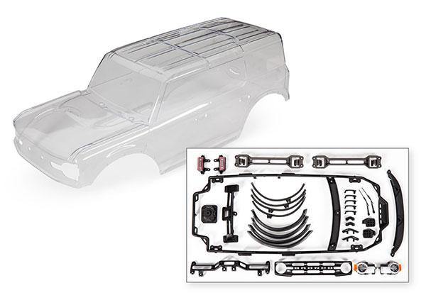 Traxxas Body, Ford Bronco (2021) (clear, requires painting)/ decals/ window masks (includes grille, side mirrors, door handles, fender flares, windshield wipers, spare tire mount, clipless mounting, hardware) (requires #8080X inner fenders) 9211 - Excel RC